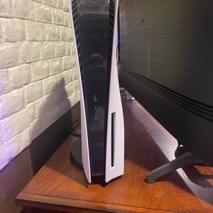 I am selling a ps5 with controllers 1 turtle beach headset and 4 ps5 games